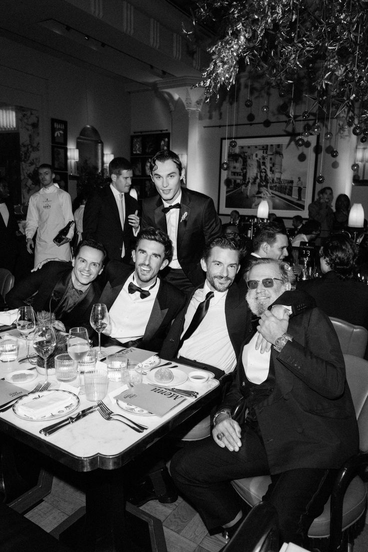 Elegantly dressed guests at a gala dinner